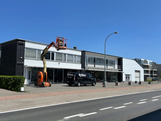 Restauratie van schilderwerk. Kindergarage